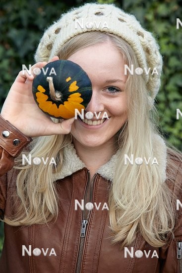 N1003843 Girl with ornamental pumpkin